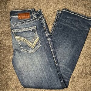 Buckle Blue Bootcut Jeans with Brown Accents